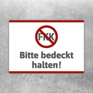 Aufkleber mit durchgestrichenem FKK-Symbol und dem Text Bitte bedeckt halten.
