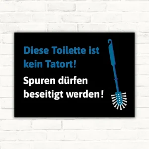 Schild Toilette Tatort mit Hinweistext und Toilettenbürste als Motiv