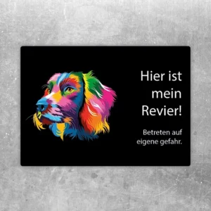 Aufkleber mit farbigem Spaniel und dem Hinweis „Hier ist mein Revier! Betreten auf eigene Gefahr.“