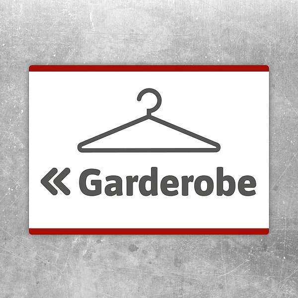 Aufkleber mit Garderobe und Pfeil nach links zur klaren Wegweisung im Eingangsbereich.
