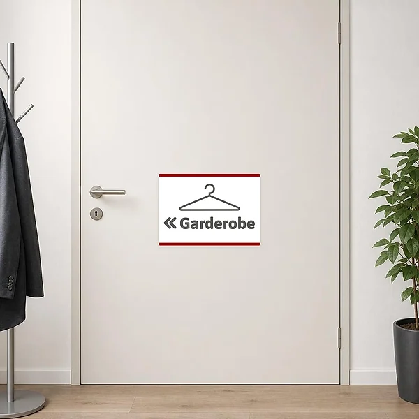 Hinweisaufkleber mit Garderobe und linkem Pfeil für die Besucherführung zur Garderobe.