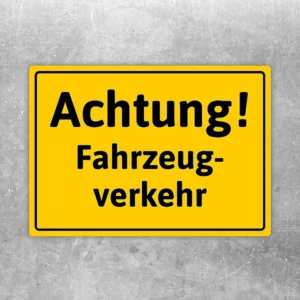 Aufkleber mit dem Hinweis Achtung Fahrzeugverkehr für Zufahrten und Betriebsbereiche