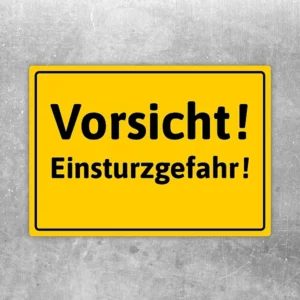 Gelber Aufkleber mit der Aufschrift Vorsicht! Einsturzgefahr! für Warnhinweise.