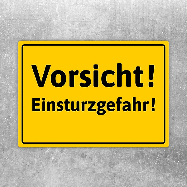 Gelber Aufkleber mit der Aufschrift Vorsicht! Einsturzgefahr! für Warnhinweise.