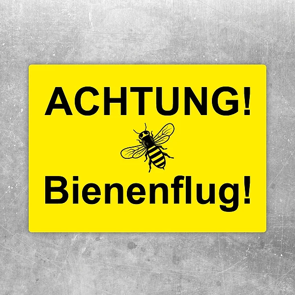 Aufkleber mit dem Hinweis Achtung Bienenflug und einer Biene in der Mitte.