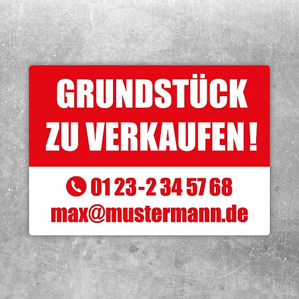 Aufkleber mit dem Hinweis „Grundstück zu verkaufen“ in roter und weißer Gestaltung.