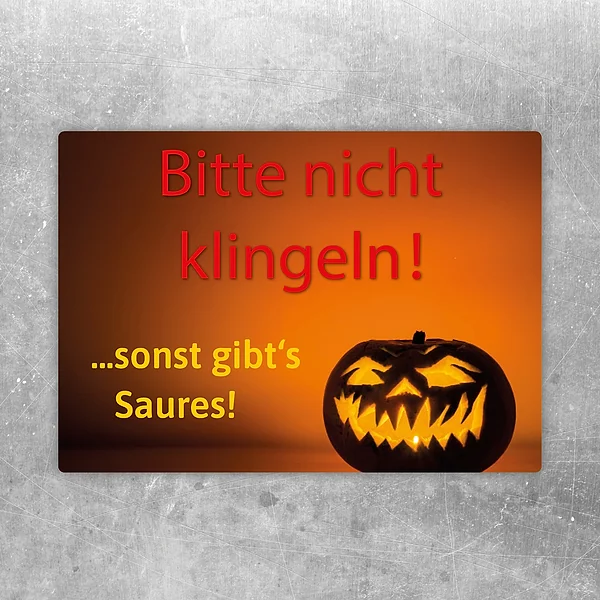 Aufkleber mit Halloween-Kürbis und dem Hinweis: Bitte nicht klingeln, sonst gibt’s Saures.