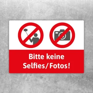 Aufkleber mit dem Hinweis Bitte keine Selfies und Fotos in roter Verbotssymbolik.