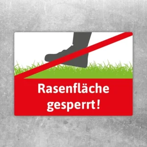 Aufkleber mit dem Hinweis Rasenfläche gesperrt für abgesperrte Grünbereiche.
