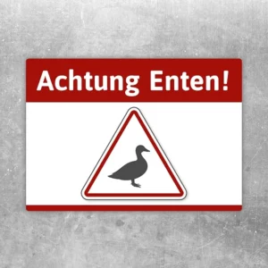 Aufkleber mit der Aufschrift Achtung Enten und einem Warnsymbol mit Ente.