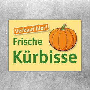 Aufkleber mit dem Hinweis Verkauf hier und dem Motiv Frische Kürbisse für den Verkaufsbereich.