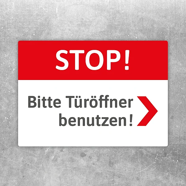 Aufkleber mit rotem Stop-Hinweis und Pfeil nach rechts: Bitte Türöffner benutzen.