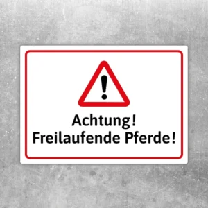 Aufkleber mit Warnsymbol und Text: Achtung! Freilaufende Pferde!