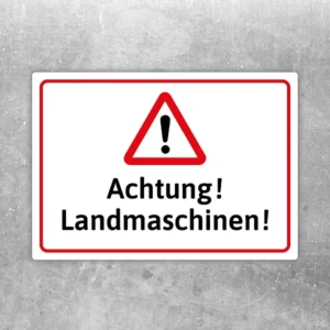 Warnaufkleber mit rotem Dreieck und dem Text „Achtung! Landmaschinen!“