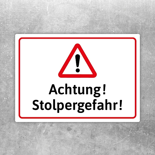 Warnaufkleber mit Dreiecksymbol und Text Achtung Stolpergefahr in Rot und Schwarz.