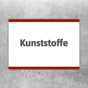 Aufkleber mit der Aufschrift Kunststoffe zur Kennzeichnung eines Sammelbereichs für Kunststoffabfälle.