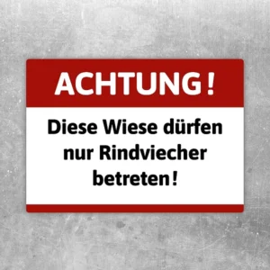 Aufkleber mit dem Spruch „Achtung! Diese Wiese dürfen nur Rindviecher betreten“ in Rot, Weiß und Schwarz.