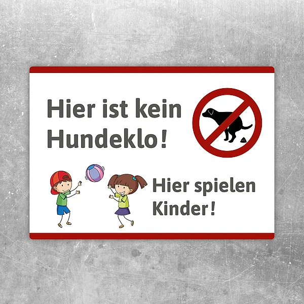 Aufkleber mit Hinweis „Hier ist kein Hundeklo, hier spielen Kinder“ und kindgerechtem Motiv.