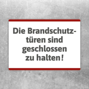 Aufkleber mit der Aufschrift „Brandschutztüren geschlossen halten“ als klare Kennzeichnung