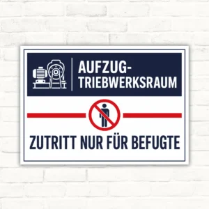 Schild mit Aufzug-Triebwerksraum und dem Text „Zutritt nur für Befugte“ als beschriftetes Hinweisschild.