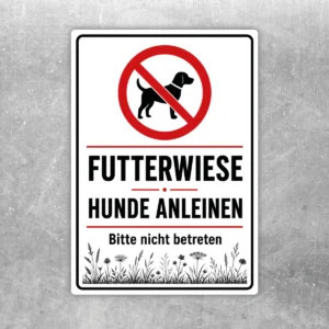 Hundeschild Futterwiese – Hunde anleinen Aufkleber mit rotem Verbotssymbol, schwarzer Hundesilhouette und Hinweis auf weißem Hintergrund.