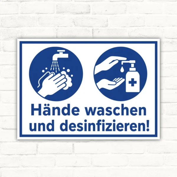 Schild mit dem Text „Hände waschen und desinfizieren!“ und zwei blauen Hygienesymbolen als Hinweisschild.