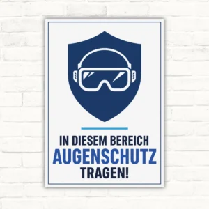 Schild mit Schutzbrillen-Symbol und dem Text „In diesem Bereich Augenschutz tragen!“ für Werkstatt und Betrieb.