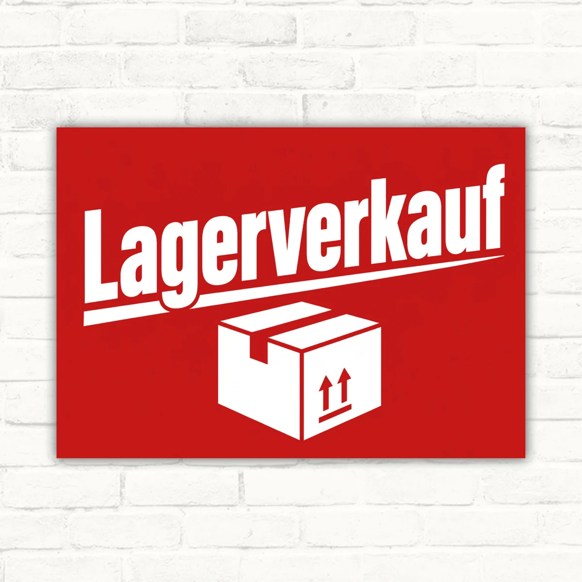 Rotes Lagerverkauf Werbeschild mit weißem Schriftzug und Kartonsymbol, als Verkaufsschild im Querformat.