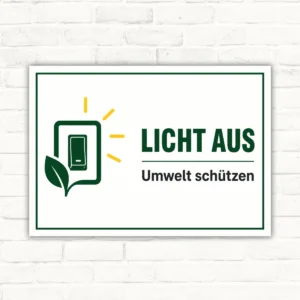 Bedrucktes Schild mit „LICHT AUS – Umwelt schützen“, grünem Schalter- und Blattmotiv auf weißem Hintergrund.