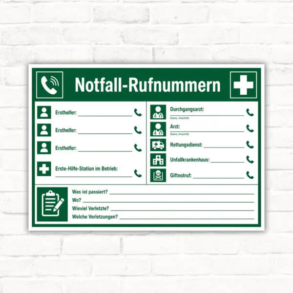 Notfall-Rufnummern Aushang als grün-weißes Hinweisschild mit Ersthelfer-, Arzt- und Rettungsdienst-Feldern für den Betrieb.