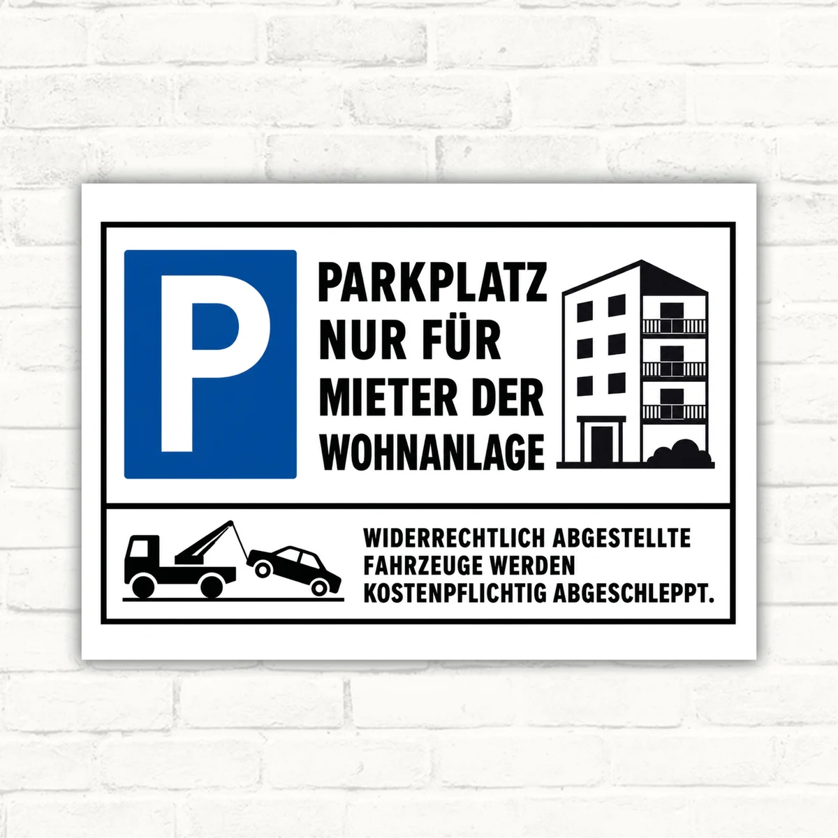 Parkplatzschild mit blauem P-Symbol und Text „Parkplatz nur für Mieter der Wohnanlage“ samt Abschlepphinweis.