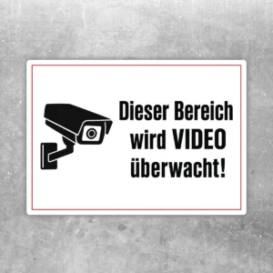 Videoüberwachung Aufkleber mit Kamera-Symbol und dem Text „Dieser Bereich wird überwacht“ in Schwarz, Weiß und Rot.