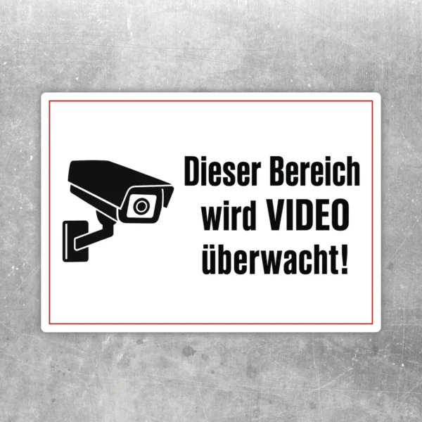 Videoüberwachung Aufkleber mit Kamera-Symbol und dem Text „Dieser Bereich wird überwacht“ in Schwarz, Weiß und Rot.