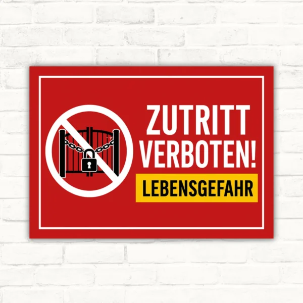 Zutritt verboten Schild mit rotem Warnmotiv und Lebensgefahr-Hinweis als bedrucktes Verbotsschild.