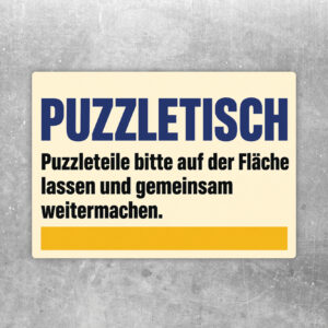 Aufkleber Puzzletisch im Querformat mit Personen am Puzzle und Hinweis, Puzzleteile auf der Fläche zu lassen.