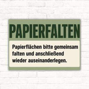 Papierfalten Schild – Papierflächen gemeinsam falten und auseinanderlegen mit gut lesbarem Motiv und klarer Beschriftung als bedrucktes Schild aus Aluminium-Verbundplatte.