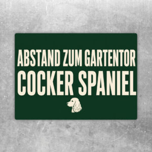 Cocker Spaniel Aufkleber im Querformat mit Text Achtung Bitte Abstand zum Gartentor halten in Rot, Blau und Weiß.