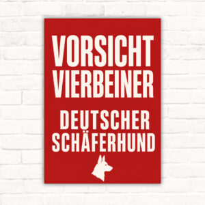 Vorsicht Hund Schild mit Deutschem Schäferhund hinter Tor und Text „Hier wacht ein Vierbeiner.“ im Hochformat.