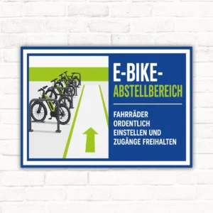E-Bike-Abstellbereich Schild mit Fahrradständer und Text Fahrräder ordentlich einstellen und Zugänge freihalten.