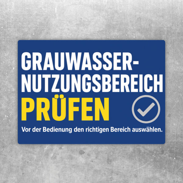 Aufkleber Nutzungsbereich prüfen mit blauem Hinweisbalken, farbiger Flächengrafik und Text zur Bereichsauswahl.