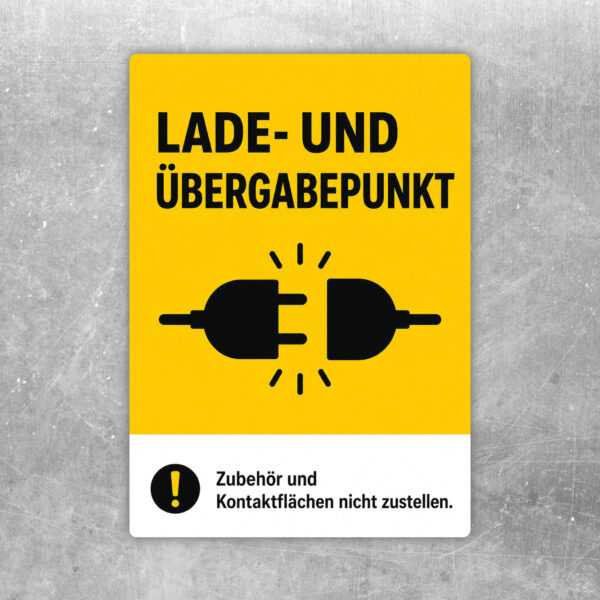 Lade- und Übergabepunkt Aufkleber in Dunkelgrün und Gold mit Hinweis, Zubehör und Kontaktflächen nicht zuzustellen.