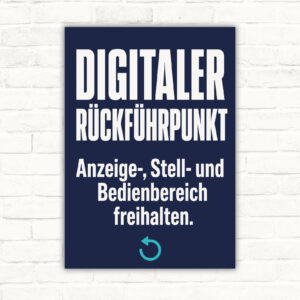 Schild „Digitaler Rückführpunkt“ mit Text „Anzeige-, Stell- und Bedienbereich freihalten“ und Transportboxen.