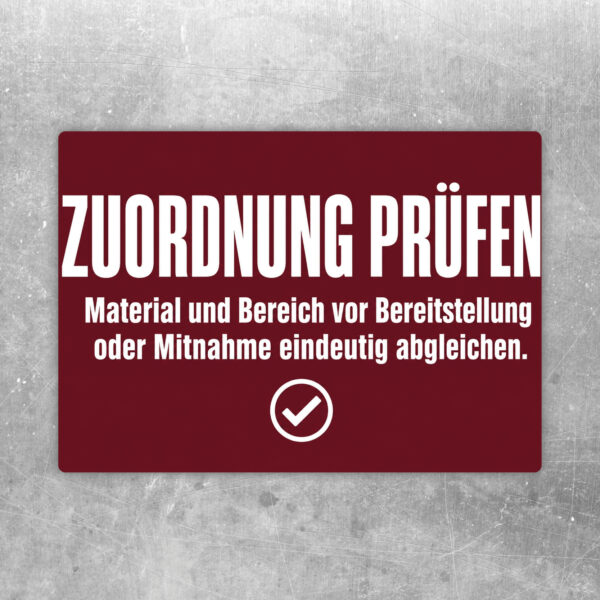 Zuordnung prüfen Aufkleber mit Symbolen für Material, Rasterfeld und Haken zum Abgleich von Bereich und Bereitstellung.