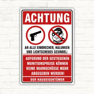 Achtung-Einbrecher-Schild mit Pistolenmotiv, Verbotssymbol und humorvollem Text auf rotem Hintergrund als bedrucktes Schild.