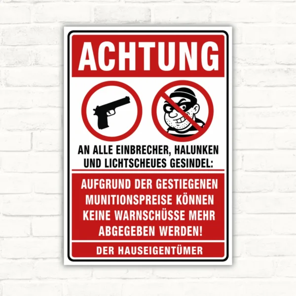 Achtung-Einbrecher-Schild mit Pistolenmotiv, Verbotssymbol und humorvollem Text auf rotem Hintergrund als bedrucktes Schild.