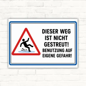 Warnschild mit rotem Dreieck, ausrutschender Person und Text „Dieser Weg ist nicht gestreut! Benutzung auf eigene Gefahr!“.