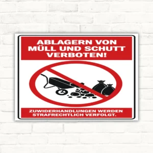 Schild mit rotem Verbotssymbol und Text „Ablagern von Müll und Schutt verboten!“ als Verbotsschild.