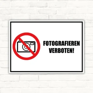 Fotografieren verboten Schild im Querformat mit rotem Verbotssymbol und Text auf weißem Hintergrund.