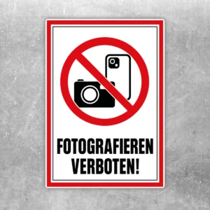 Fotografieren verboten Aufkleber mit rotem Verbotssymbol, Kameramotiv und schwarzem Text auf weißem Hintergrund.