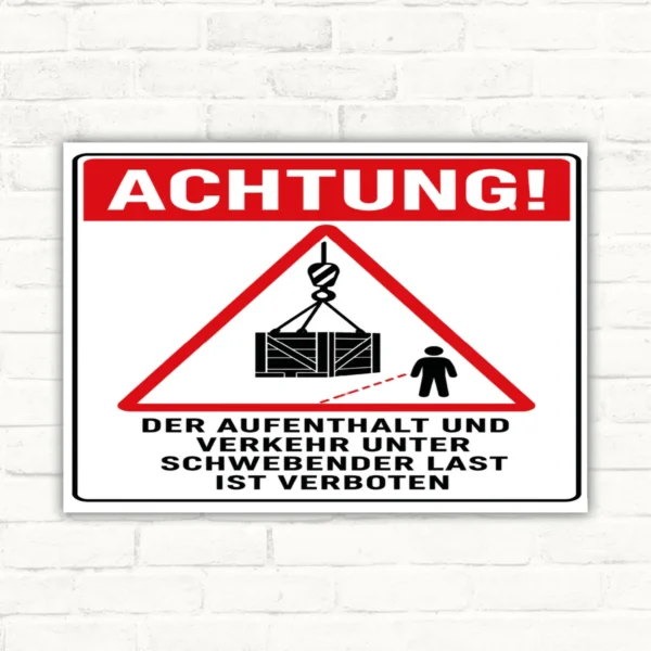 Warnschild mit rotem Dreieck und Kranlast, Text: Aufenthalt und Verkehr unter schwebender Last ist verboten.